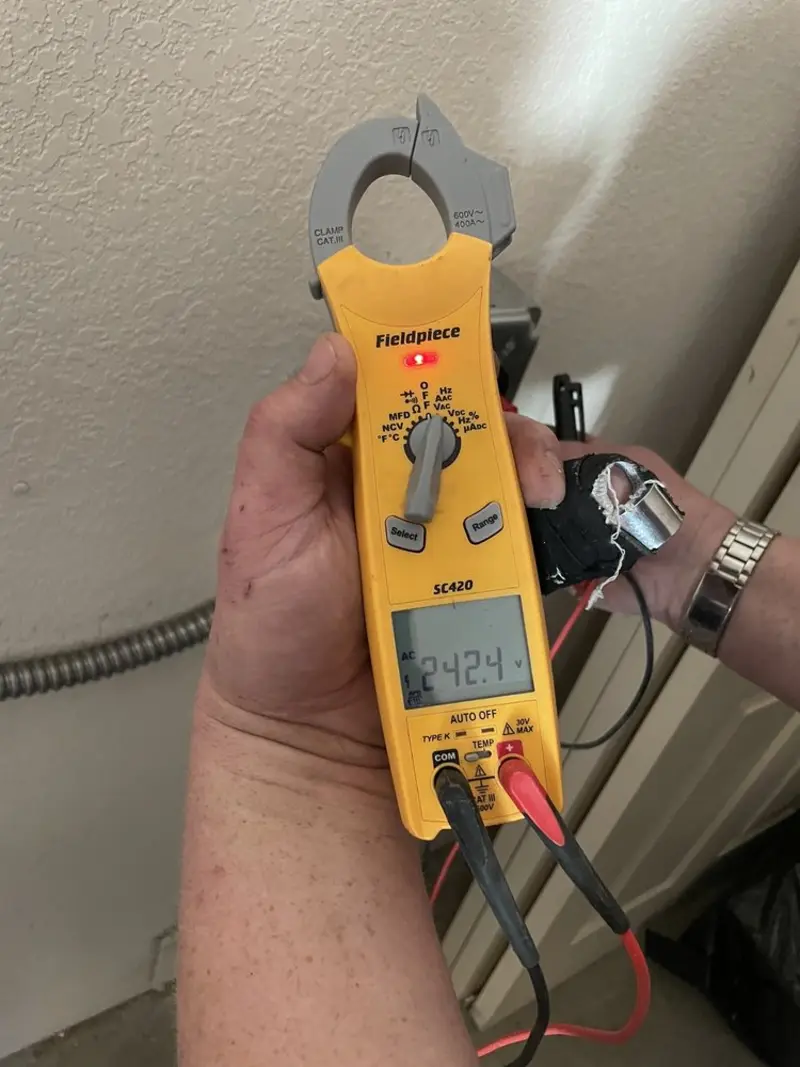 Voltage testing with clamp meter during Aluminum Wiring Replacement in Cloverleaf